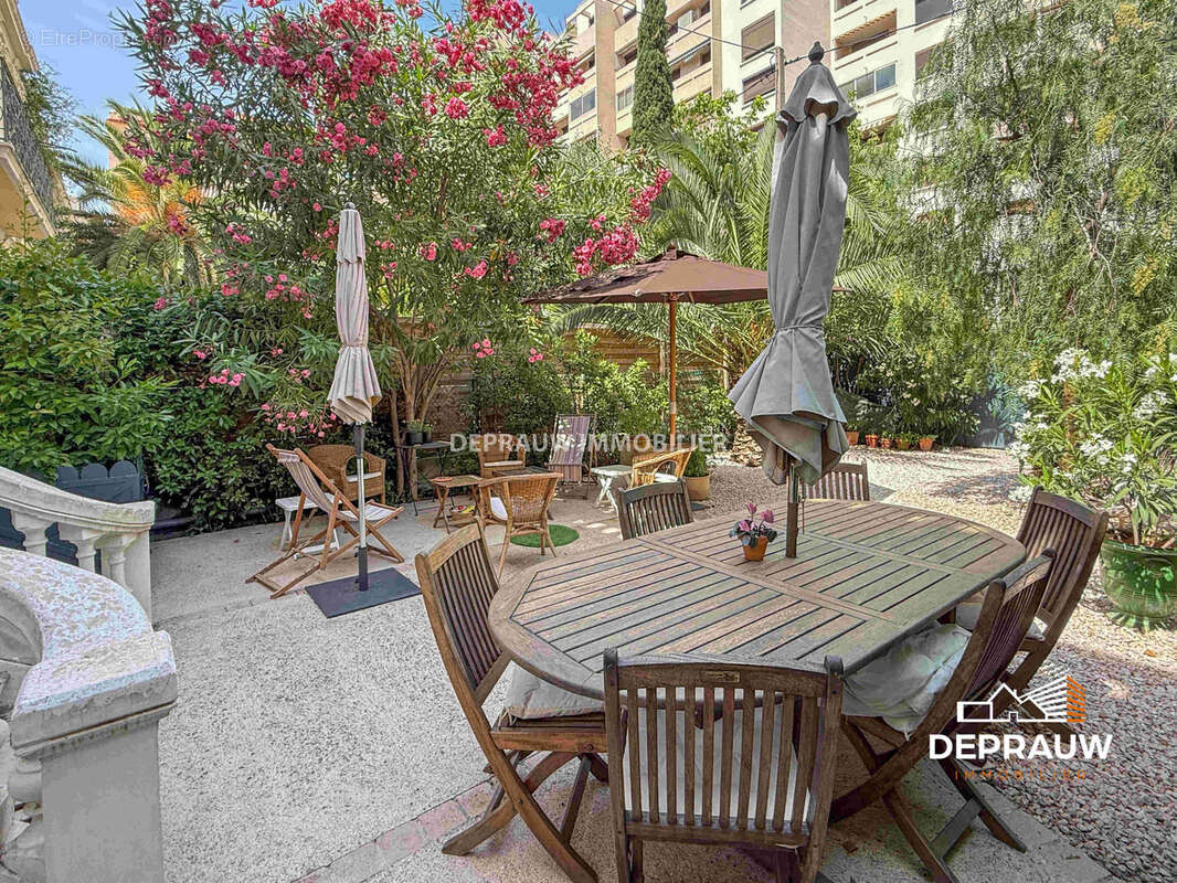Élégante demeure de caractère de 160 m2 avec jardin arboré de 100 m2 - photo 2