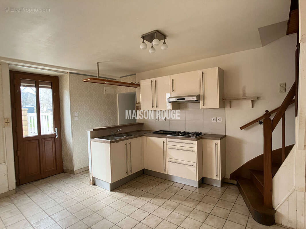 Maison à HENANBIHEN