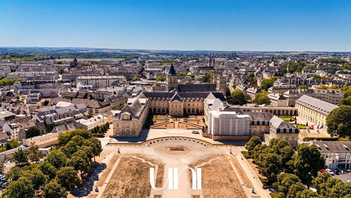 Appartement 5 pièces de 98 m2 avec caves, balcon, ascenseur et parkings - CAEN Saint-Gilles - photo 17