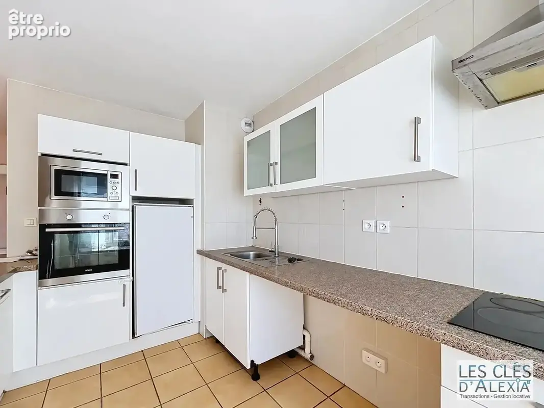 VAULX-EN-VELIN – T4 de 89,33 m² avec terrasse, jardin privatif et garage double en sus - photo 9