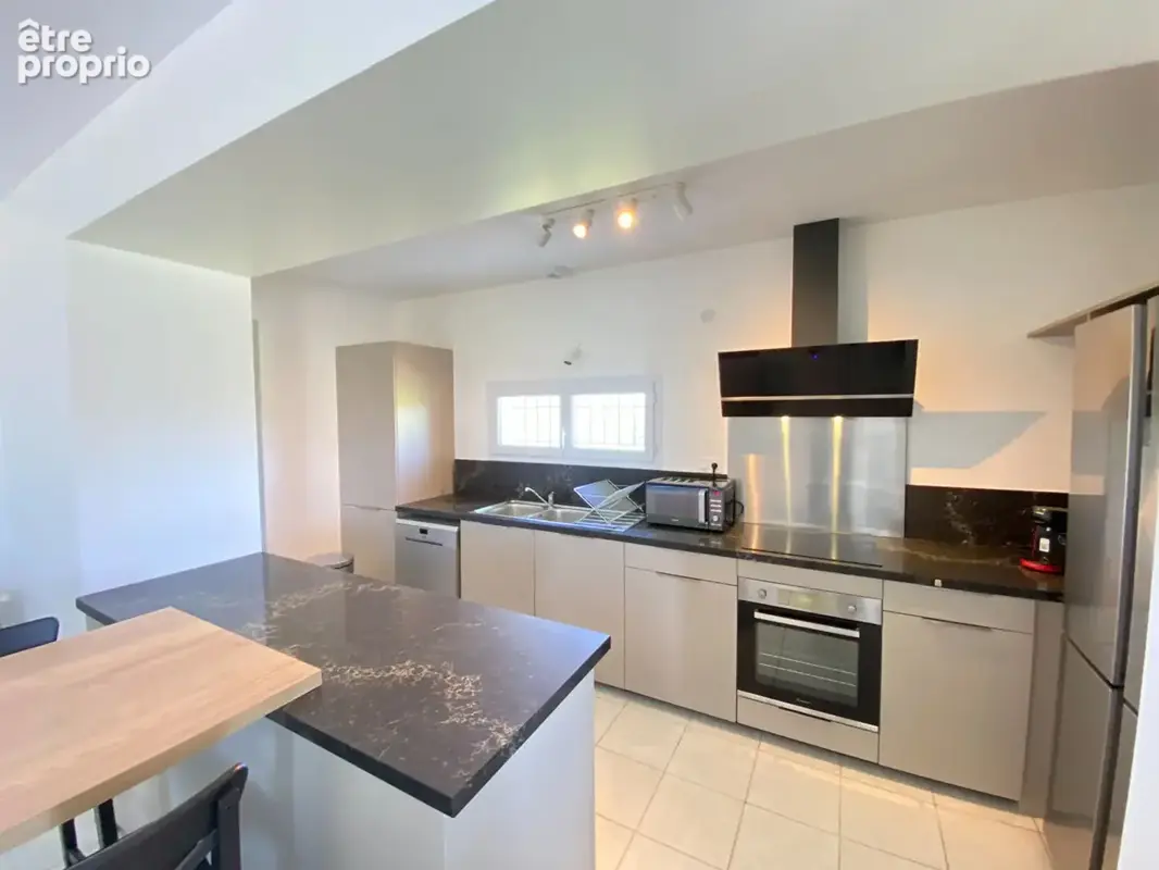 Maison divisée en 12 logements avec une belle rentabilité - photo 6