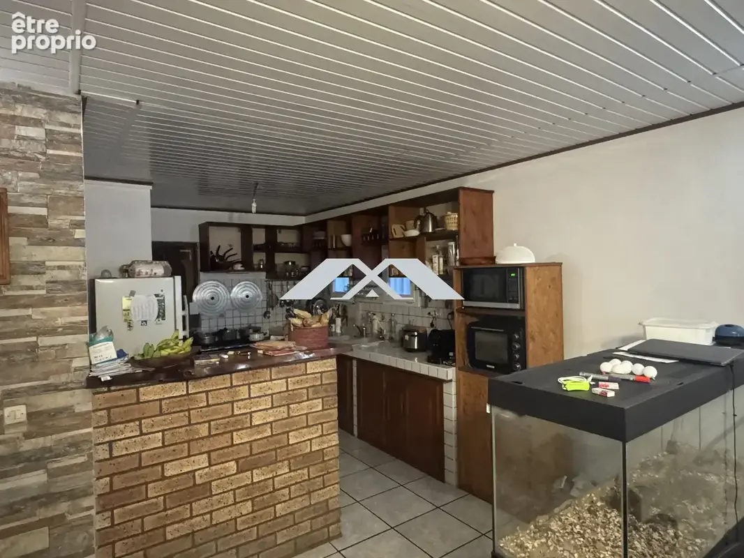 Maison 5 pièces 88 m² à vendre à Le Tampon (97430) - photo 4