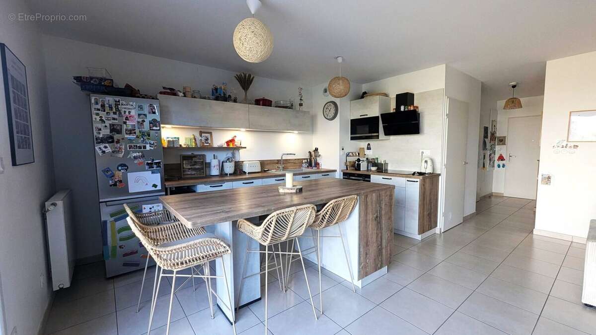 Maison 87 m² à Saint-Etienne-De-Crossey  - photo 2