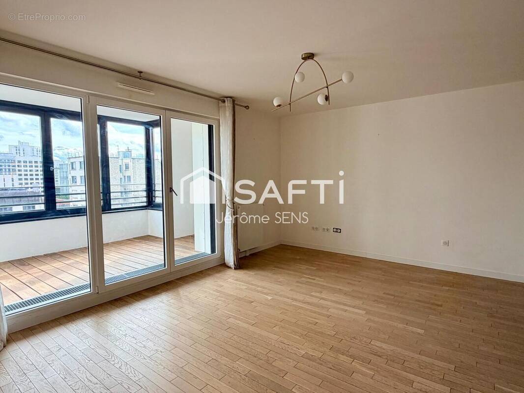 Photo 1 - Appartement à COURBEVOIE