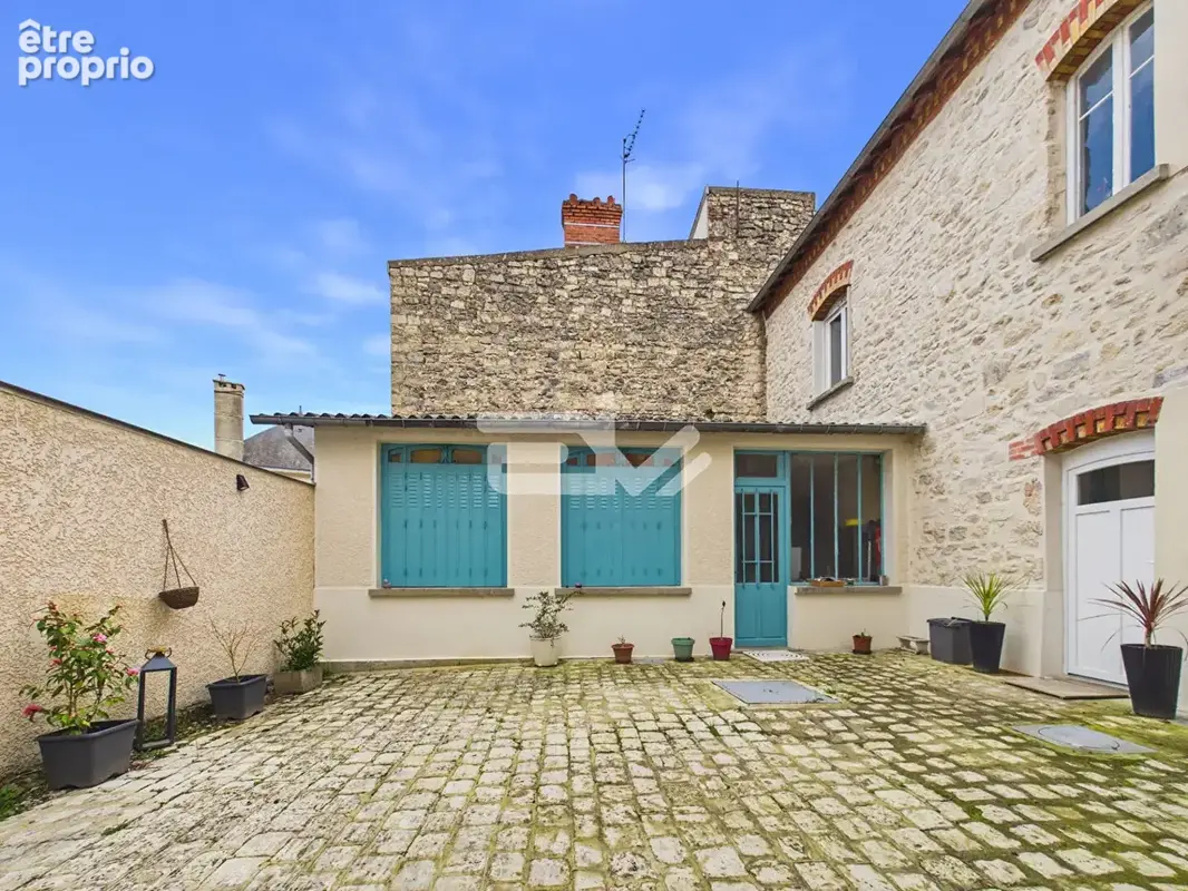 Immeuble de rapport avec local commercial et deux appartements - Environ 200 m²  -Fort potentiel - photo 7