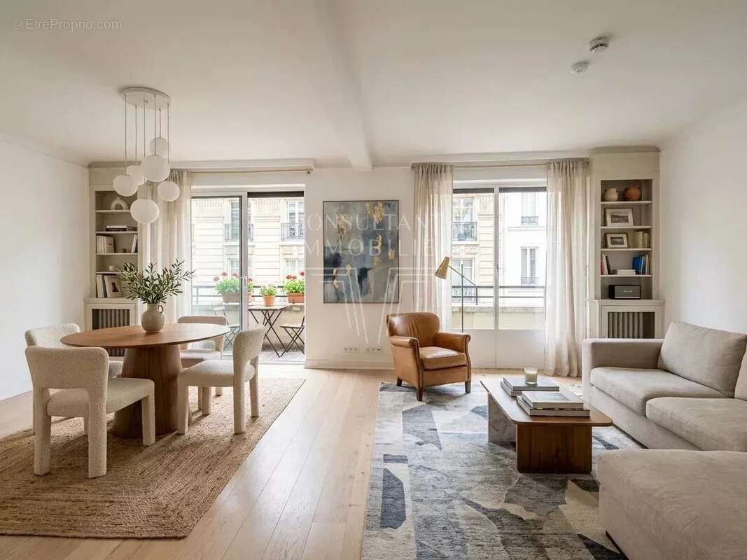 Neuilly/mairie. appartement en etage eleve avec  balcon - photo 2