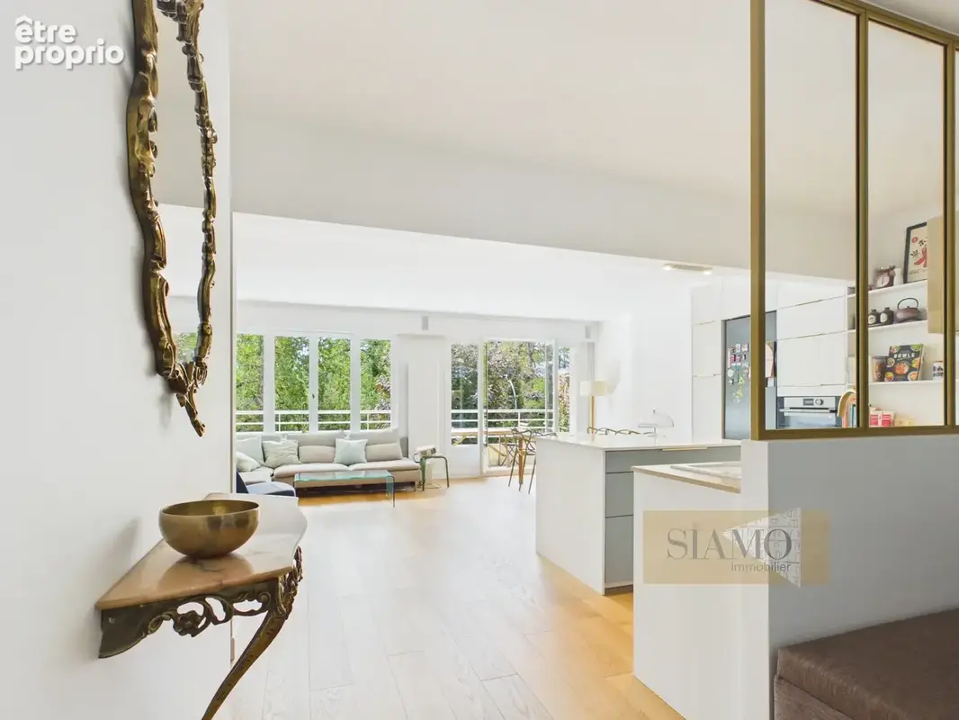 5 pieces - immeuble de standing - face bois - photo 2