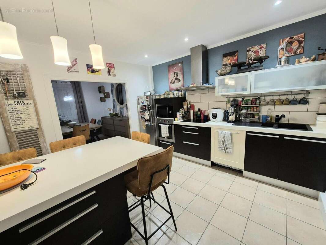 Photo 2 - Maison à LANDIVISIAU