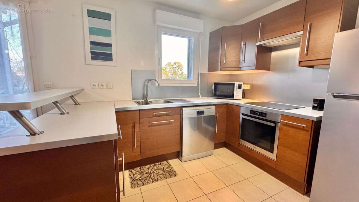 Tres beau t3 duplex avec 2 terrasses et garage ! - photo 3