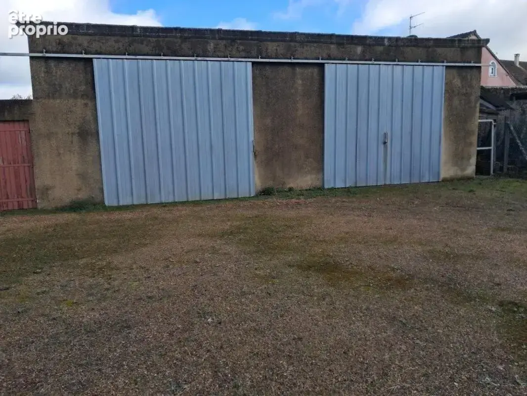 Maison de bourg sur 1000 m2 de terrain avec double garage indépendant - photo 7