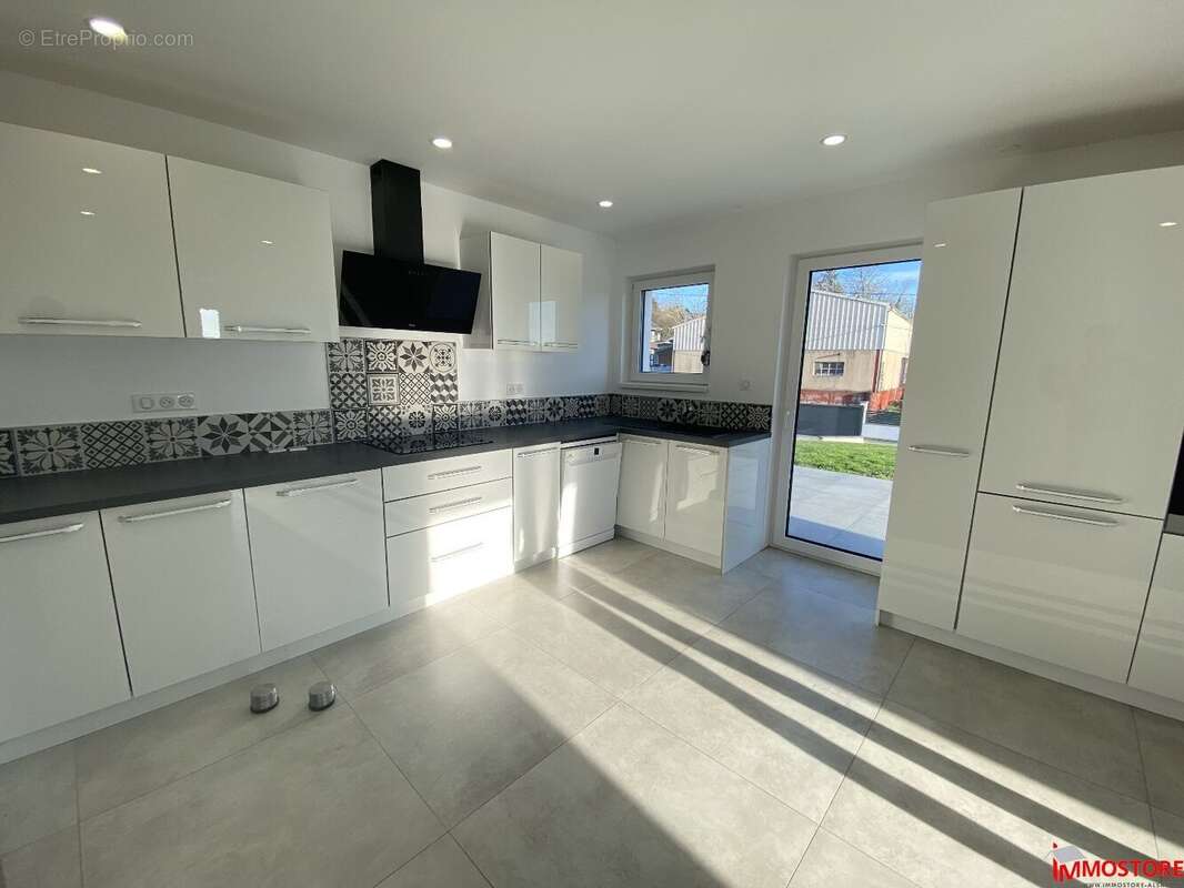 Maison à toit plat 6 pièces de 150m² - photo 5