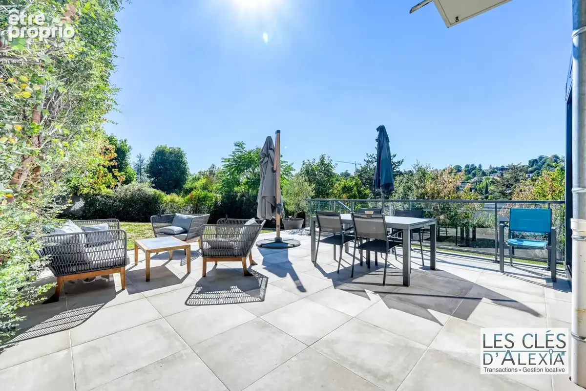 Saint-didier-au-mont-d’or — somptueuse maison contemporaine avec piscine  203 m²  terrain 2 134 m² - photo 9