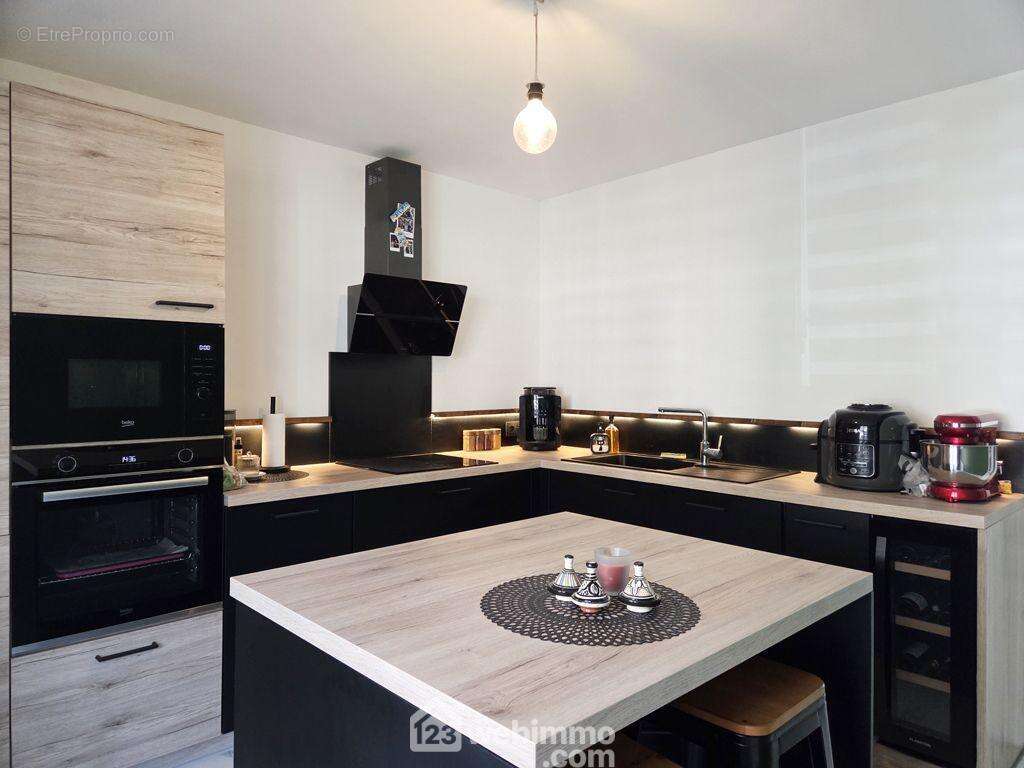 d'une belle cuisine équipée de 12m², - Appartement à LA BATHIE