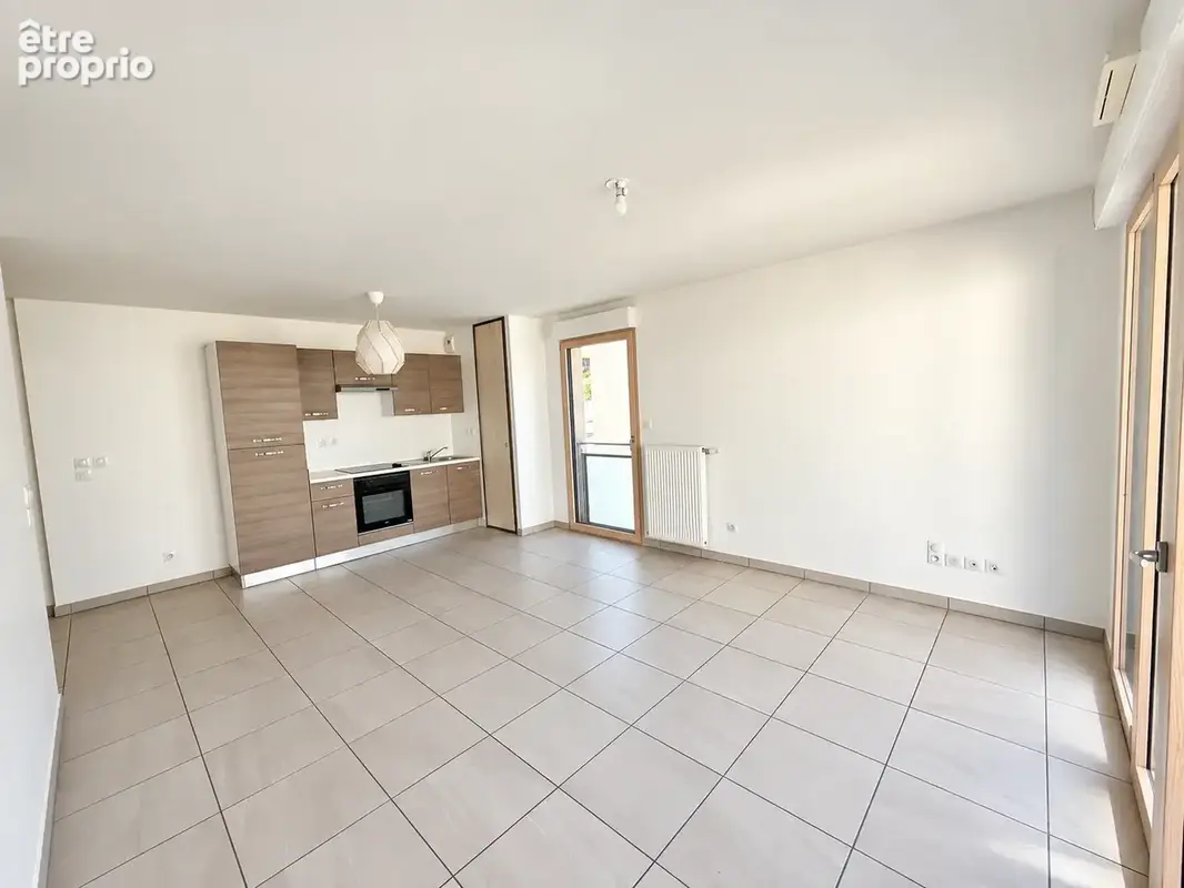 Appartement lumineux avec terrasse et garage Neuville Sur Saône 3 pièce(s) 62m2 - photo 4