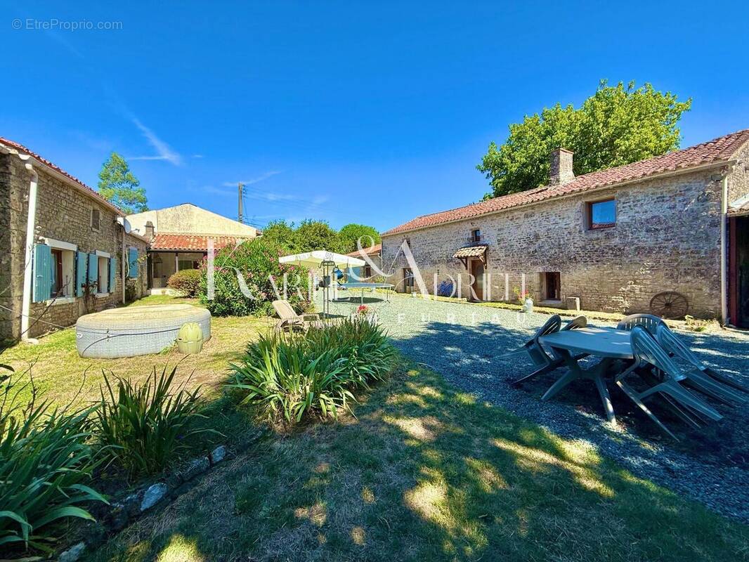 Photo 1 - Maison à SAINT-HILAIRE-DES-LOGES