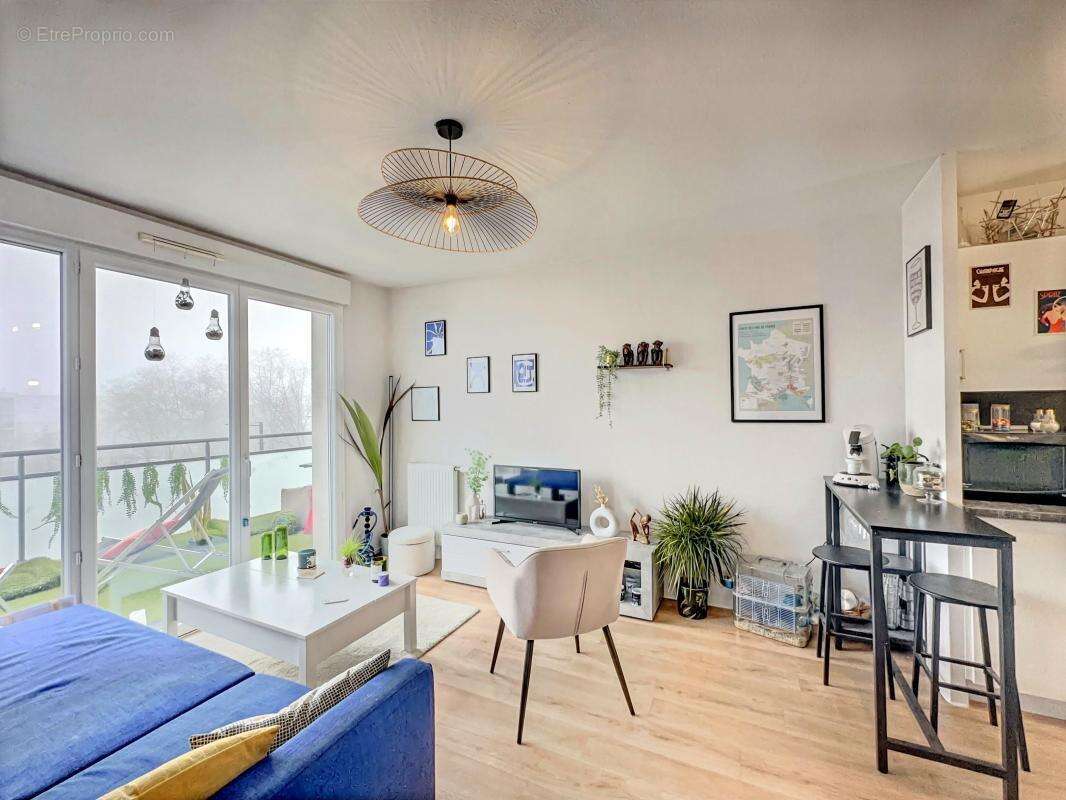 Appartement T2 idéal investisseur, bon DPE, balcon, place de parking exterieur - photo 3