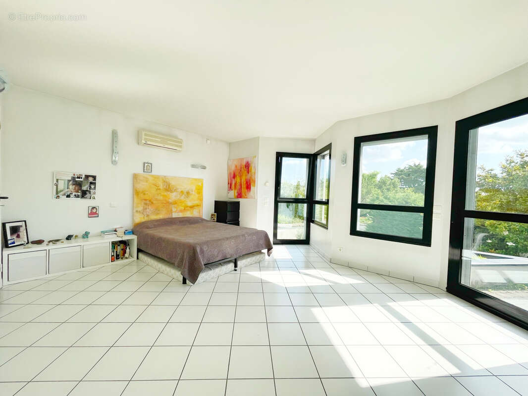 Découvrez une maison d'exception au cœur d'Irigny - photo 18
