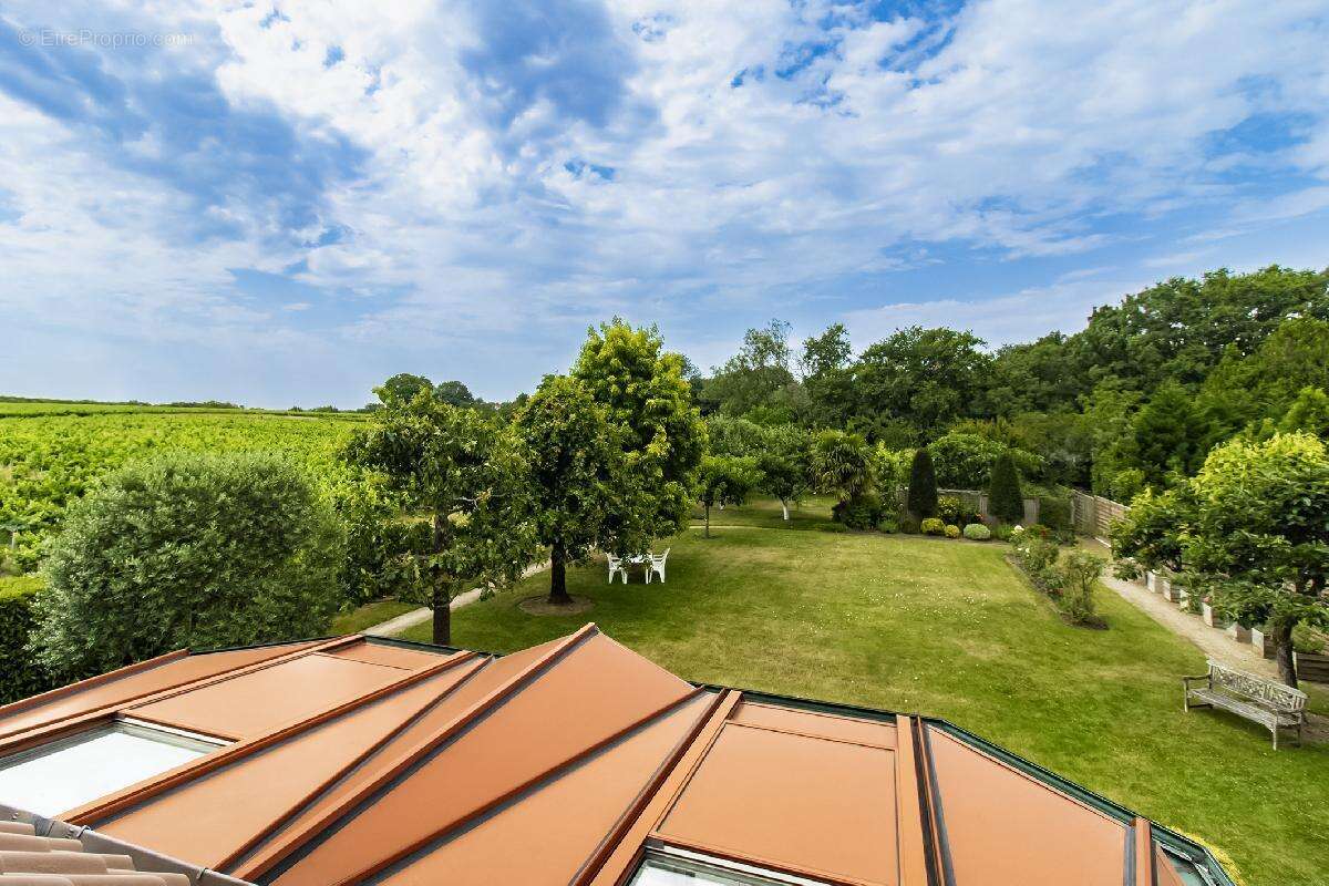 Maison traditionnelle, de 125 m² (potentiel de 150 m²) 4 chambres, bureau, sur terrain de 1923 m² magnifiquement arboré - photo 15