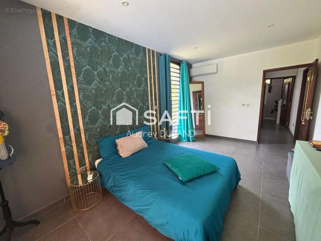 Photo 6 - Maison à REMIRE-MONTJOLY