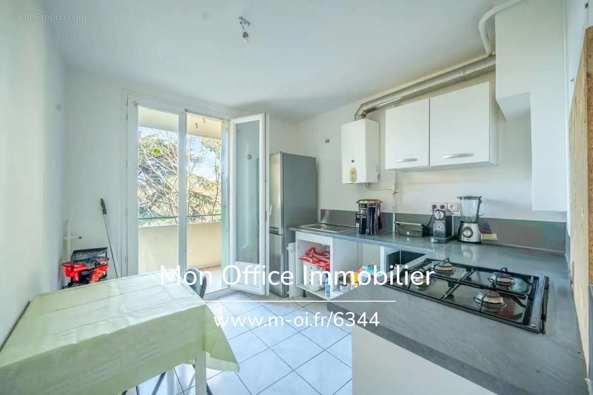 Référence : 6344-MCO - Exclusivité Appartement 1/2  pièces d'une surface de 35 m2 au dernier étage plus parking privatif et cave - photo 3