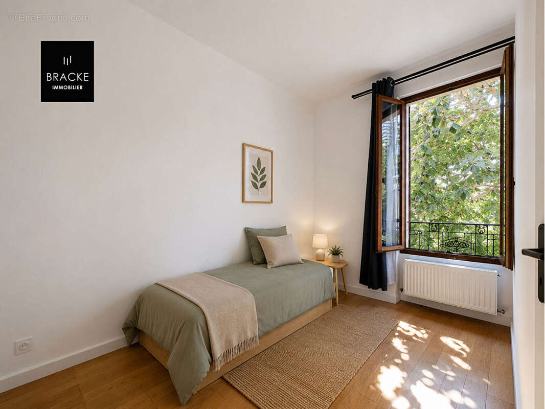 Asnières-sur-Seine -Maison de ville rénovée avec 3 chambres, patio et terrasse arborée - photo 7