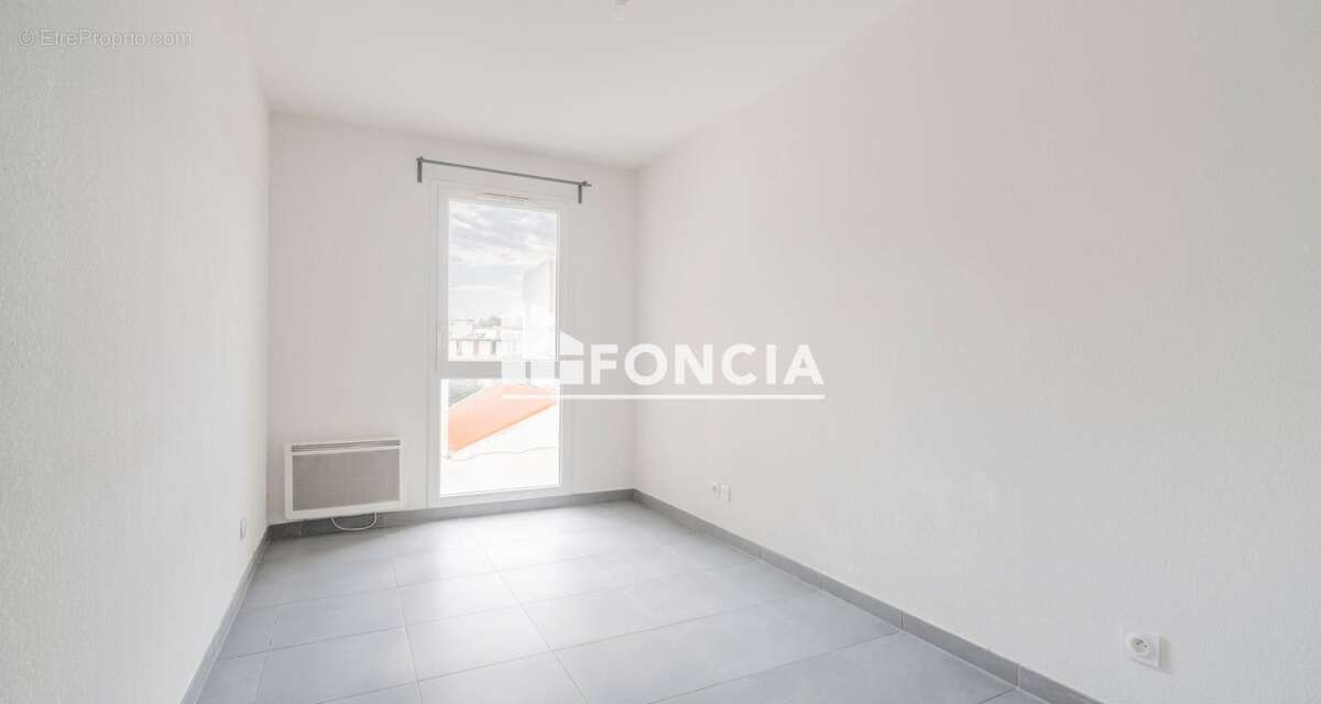 Appartement T3 de 65 m² avec terrasse de 15 m² et box – Résidence récente de standing - photo 7