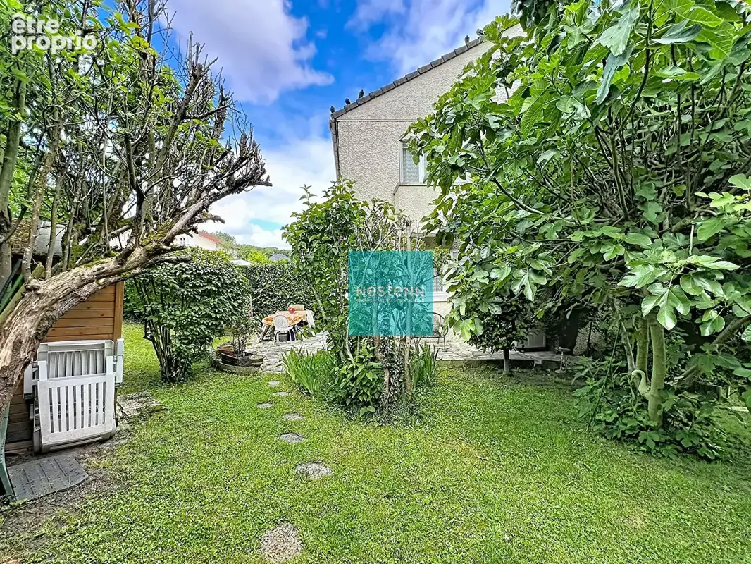 À Franconville, maison à proximité du centre-ville avec jardin, garage et beau potentiel - photo 2