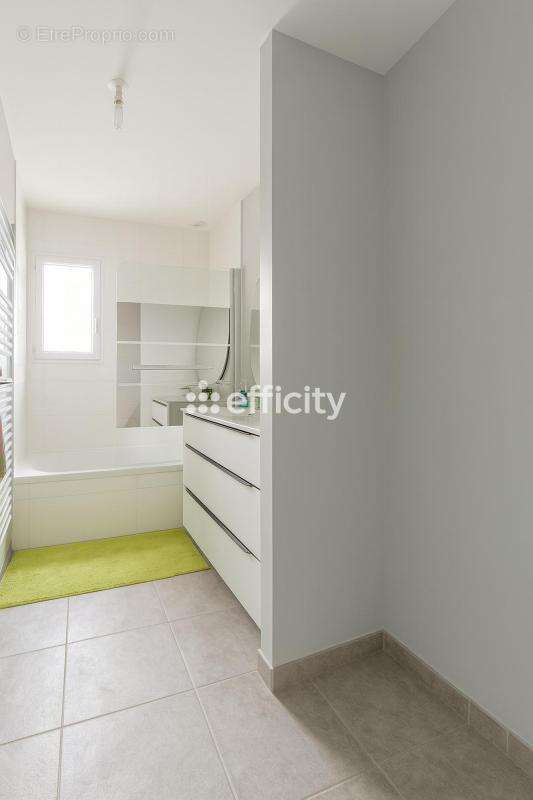 Maison 108 m² à Neuville-De-Poitou  - photo 15