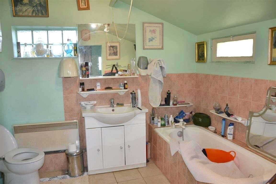 Maison 110 m² à Saint-Evroult-Notre-Dame-Du-Bois  - photo 8