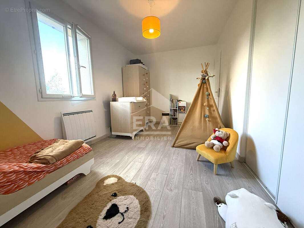 Maison à GUIGNES