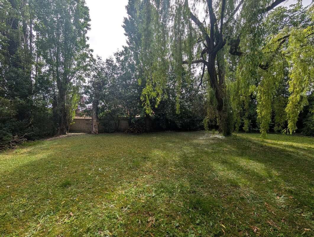 Terrain à bâtir paysager, avec garage existant - photo 3