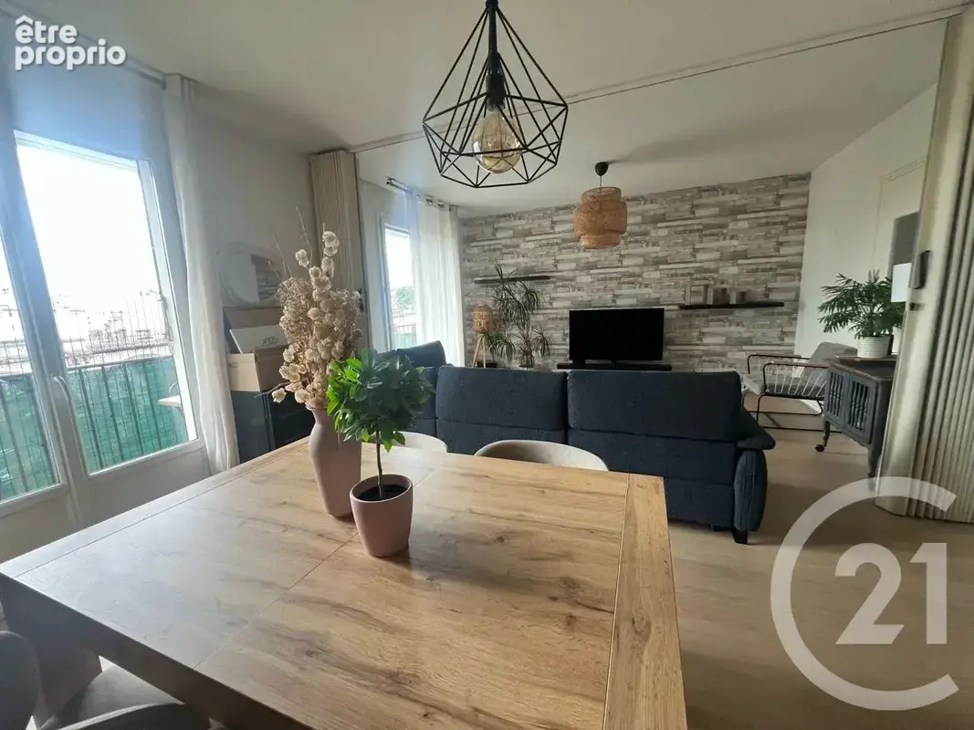 Appartement 4 pièces 88 m² à vendre à Aurillac (15000) - photo 2