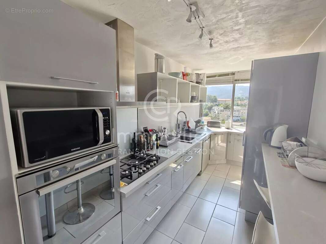 T4  de 95m²  - Parking et Cave - photo 5