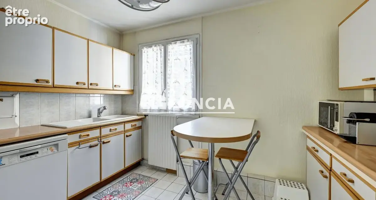 Appartement familial avec balcon ,cave et parking - photo 4
