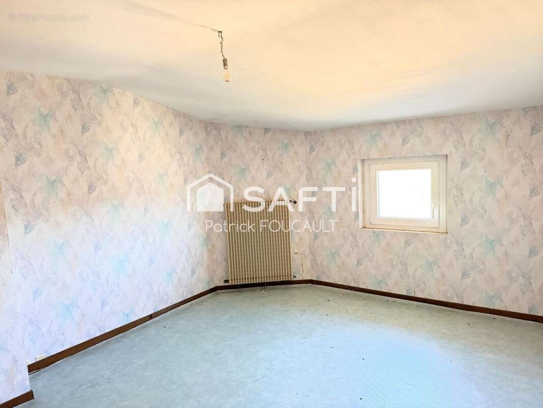 Maison 166 m² à Guesnes  - photo 6