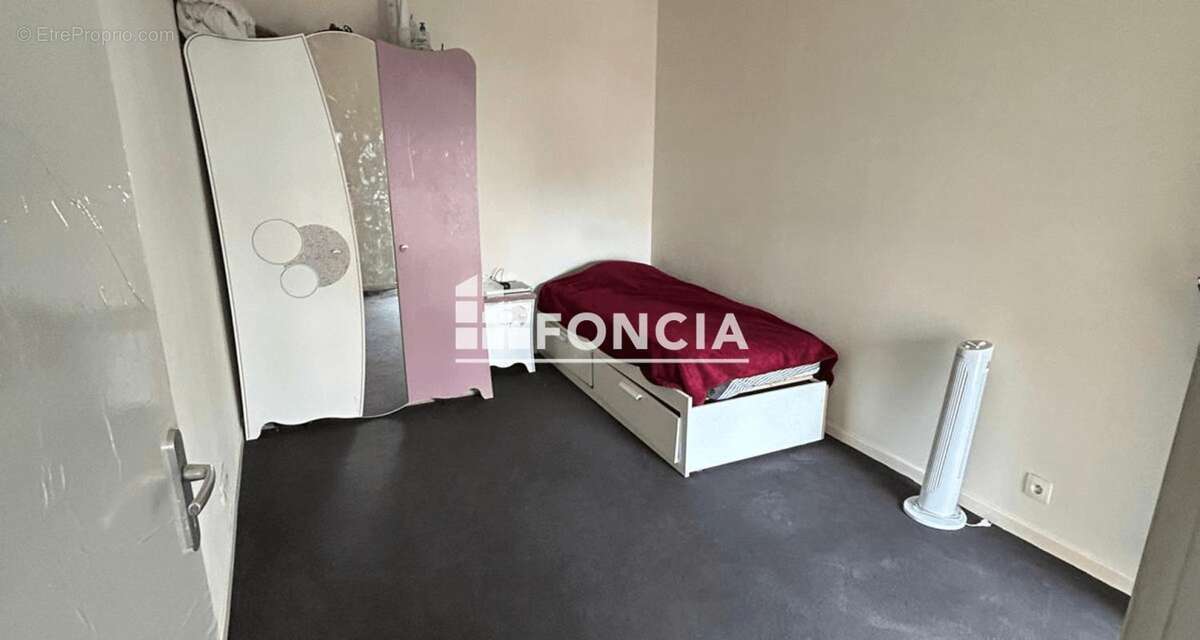 T3 56M2 Séjour, 2 chambres , balcon et place de Parking - photo 5