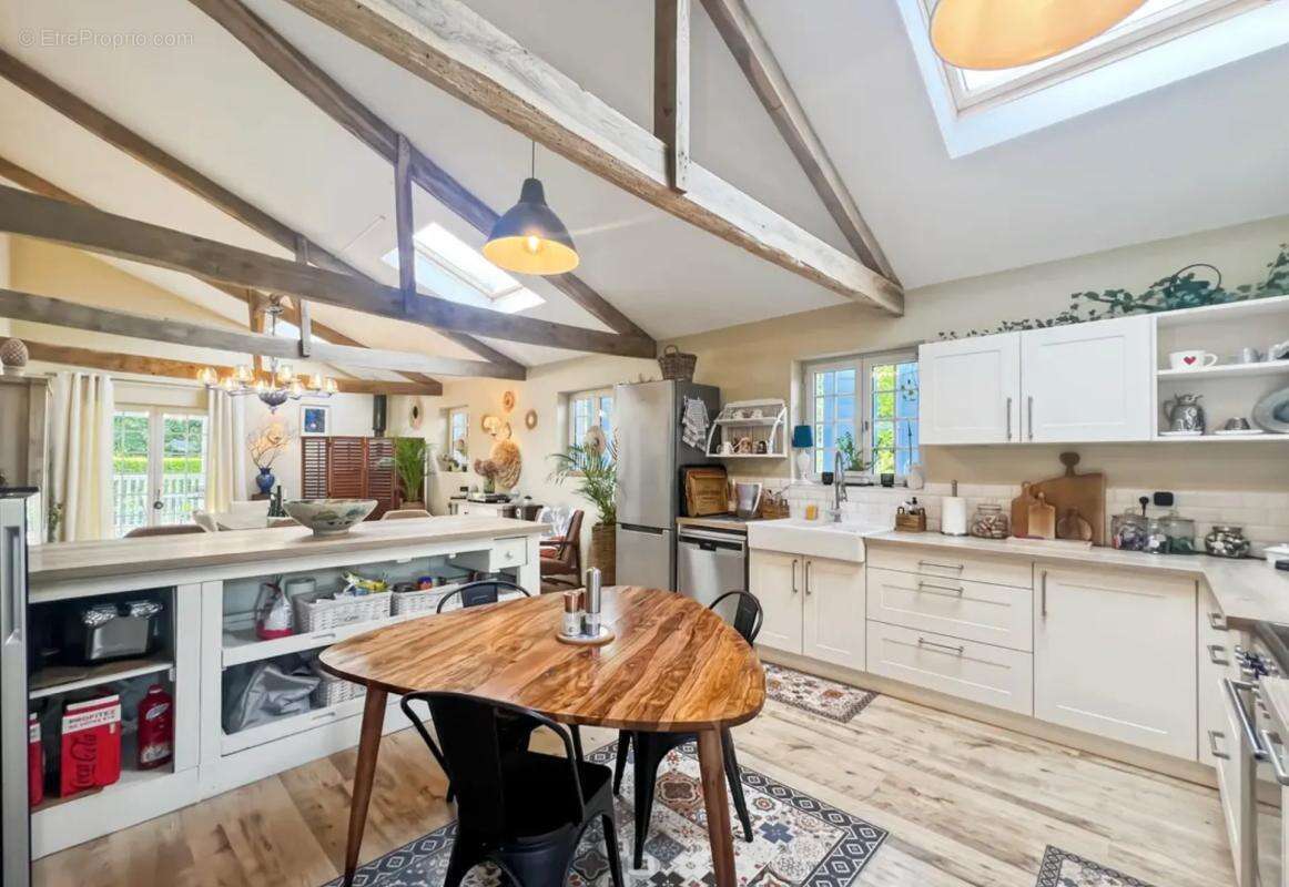 Maison de 7 pièces de 235 m² à Le Mené - photo 10