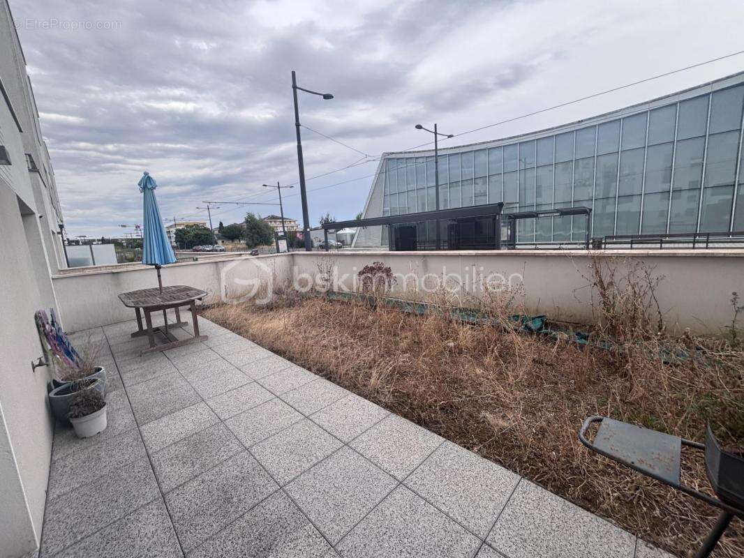 Appartement T2 en ré de jardin au pied du tramway avec stationnement - photo 9
