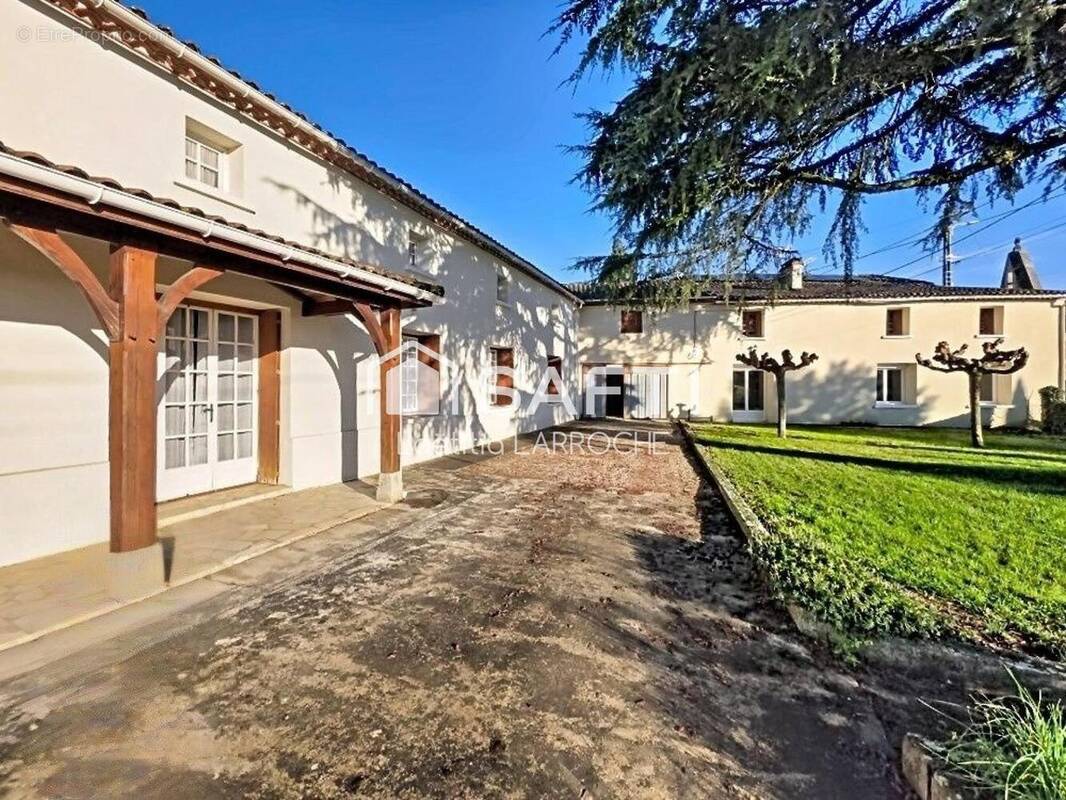 Photo 1 - Maison à CAUBON-SAINT-SAUVEUR