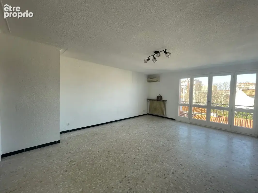 Vente appartement T4 avec balcon, cave et place de parking sécurisée, 66000 Perpignan, quartier de la gare. - photo 9