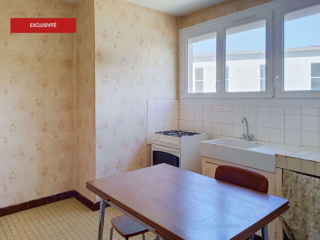 Fougères Centre, Appartement de 4 pièces avec 3 chambres et stationnement facile ! - photo 5