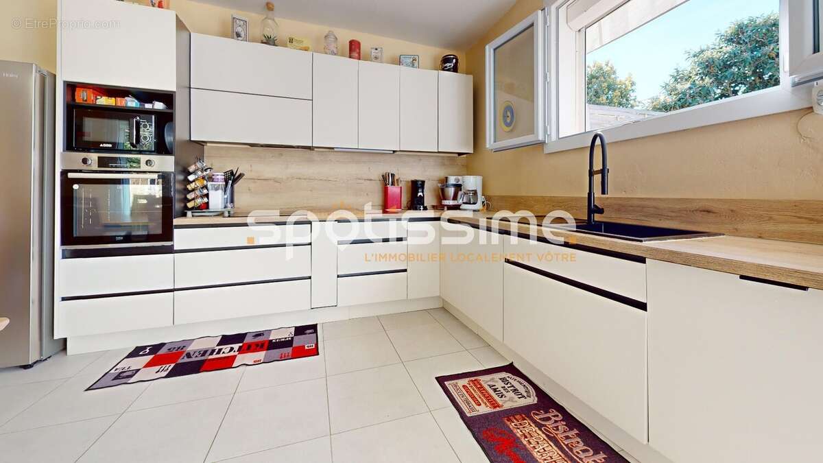 Maison de plain-pied 94 m² avec garage et jardin arboré  Quartier Mairie à Agde - photo 16