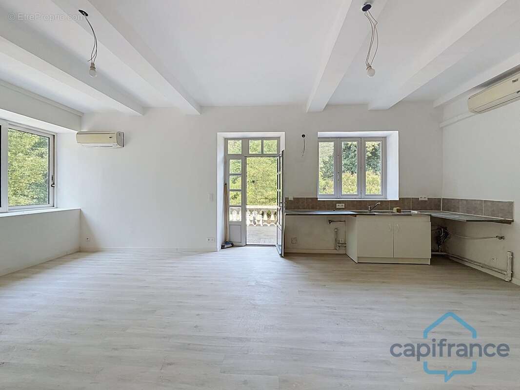 Maison à vendre avec 1 T4 de 80 m2 + 2 T2 de 36 m2 SAINT JEAN DU GARD (30)terrain environ 10719 m2 - photo 8