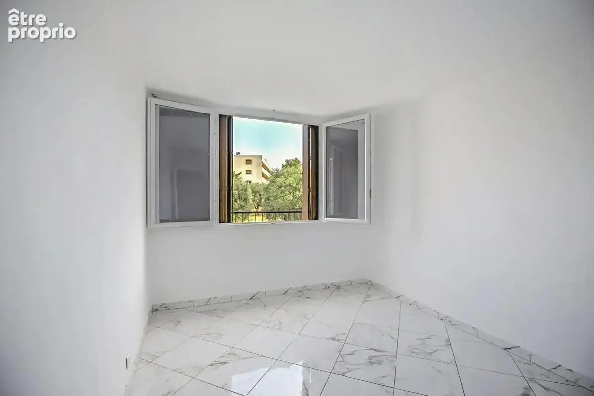 Bel appartement T3 avec loggia, cave et parking - photo 6