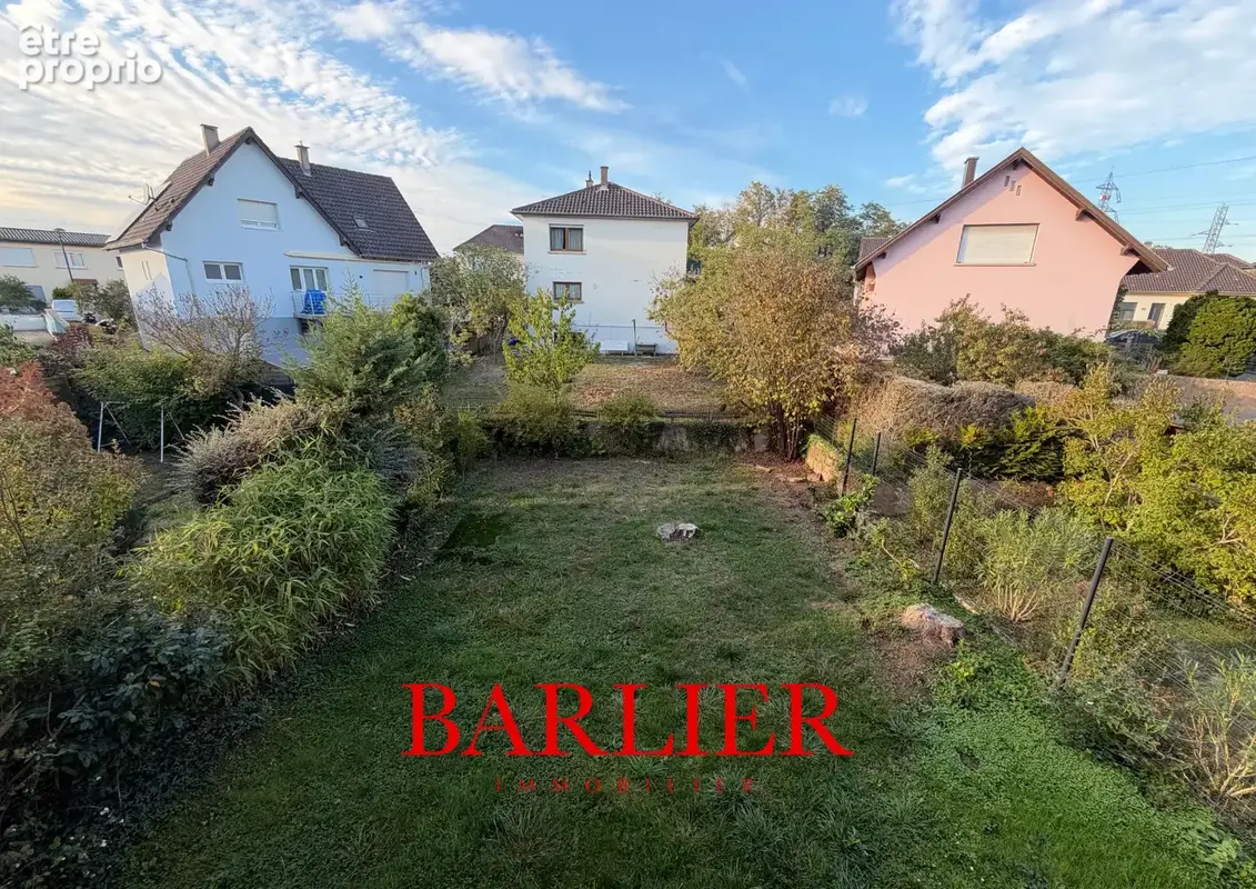Appartement 4 pièces de 92 m2 avec garage, caves et jardin. - photo 2