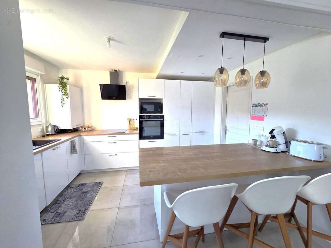 Maison 95 m² à Noyal-Chatillon-Sur-Seiche  - photo 2