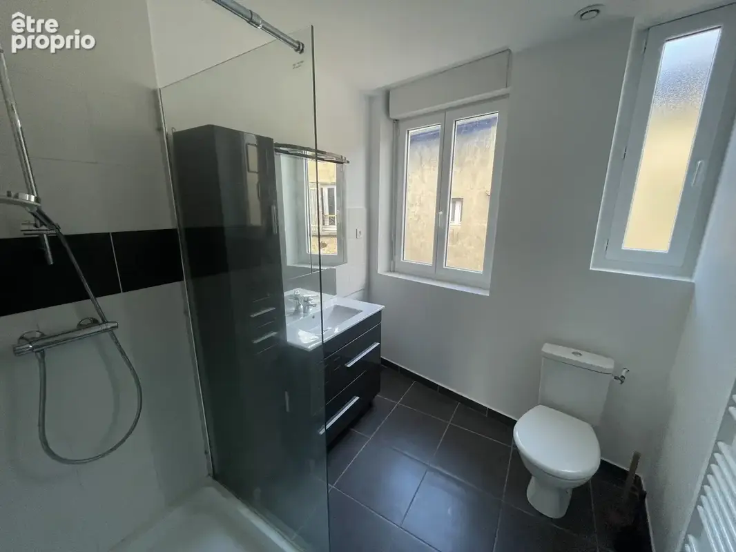 Immeuble avec 9 appartements et un local commercial - photo 4