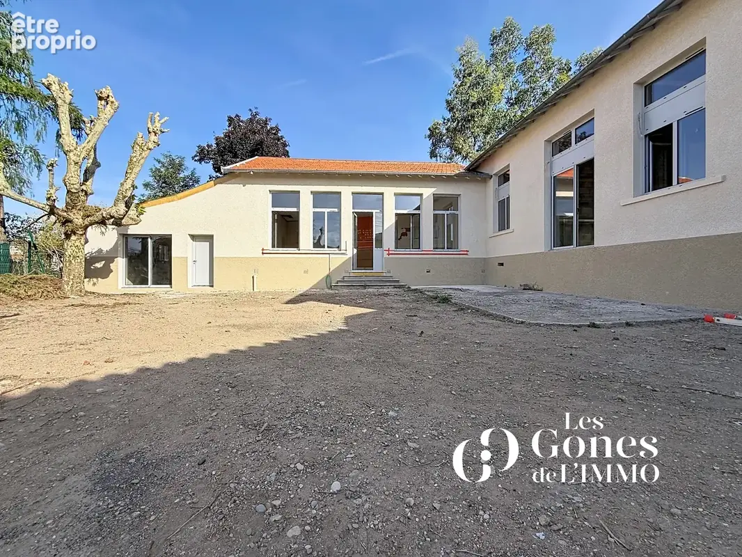 Craponne centre Plateau 120m2  avec mezzanines,  jardin de 100 m2, parking - photo 2