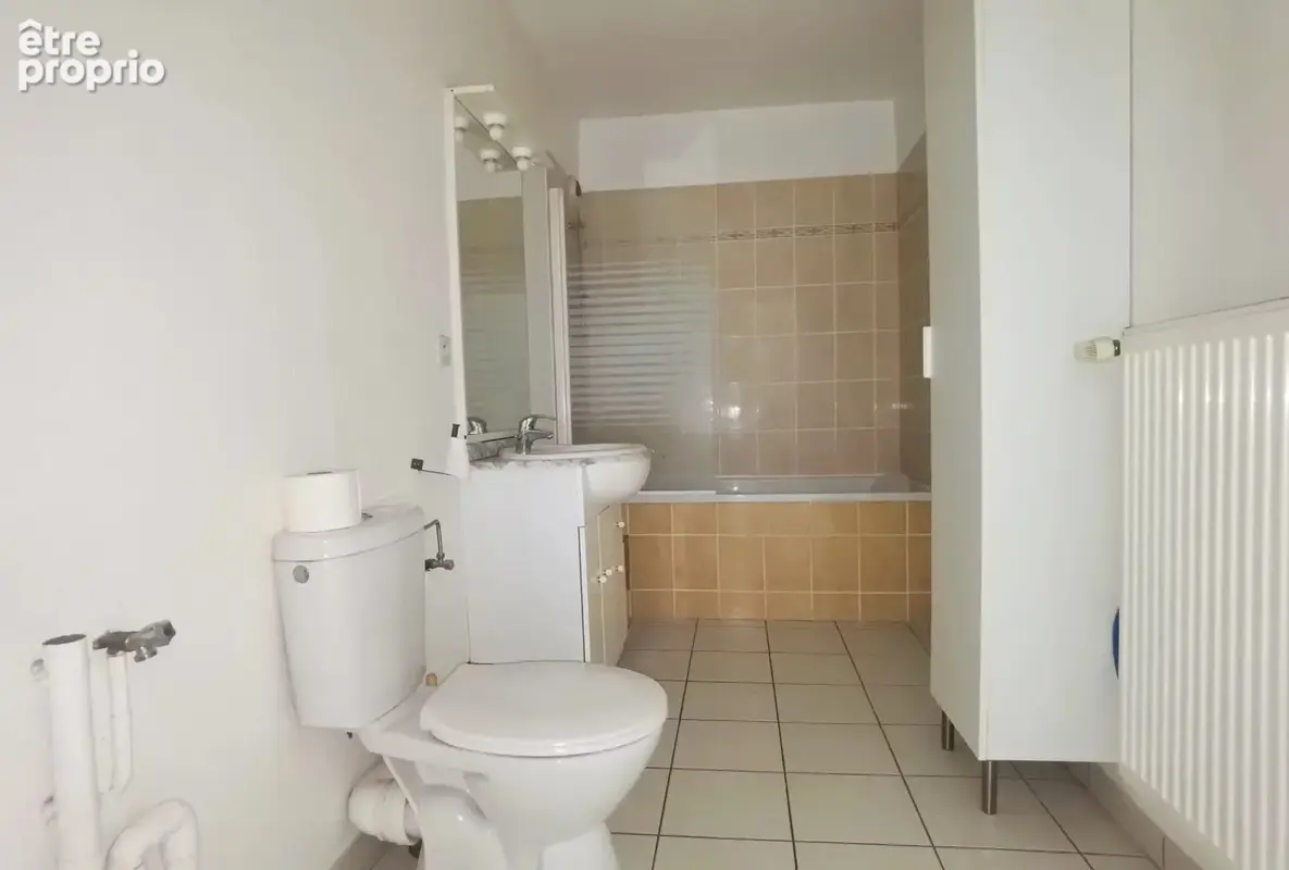 A VENDRE Appartement  2 pièces + parking - photo 4