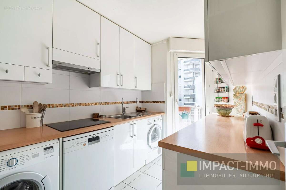 Appartement familial à Courbevoie - Étage élevé avec balcon - photo 6